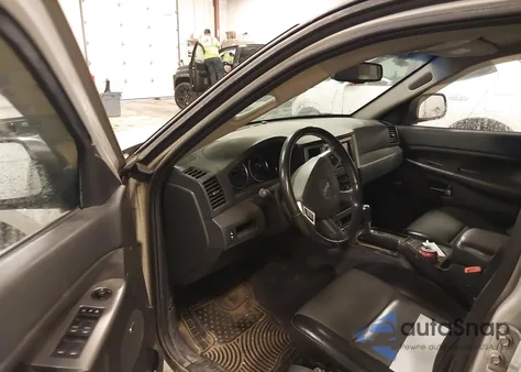 2010 Jeep Grand Cherokee Laredo z USA, uszkodzony, nr VIN 1J4PR4GK3AC137754